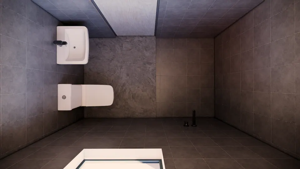 Rendered top-down view of a small bathroom: a basin and a wall-hung WC on grey stone-look tiles