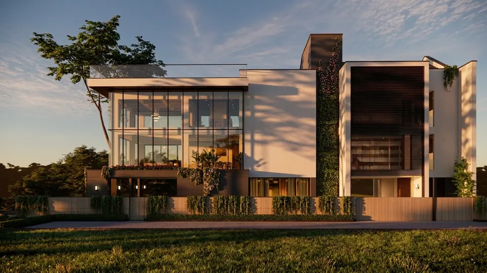 Rendered villa at sunset: a three-storey glazed corner, white rendered walls, a dark slatted volume and a low wall with planters