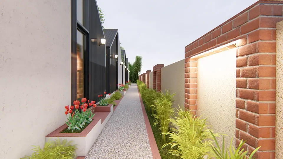 Rendered gravel path between the dark-clad pavilions and a boundary wall with lit, brick-framed niches
