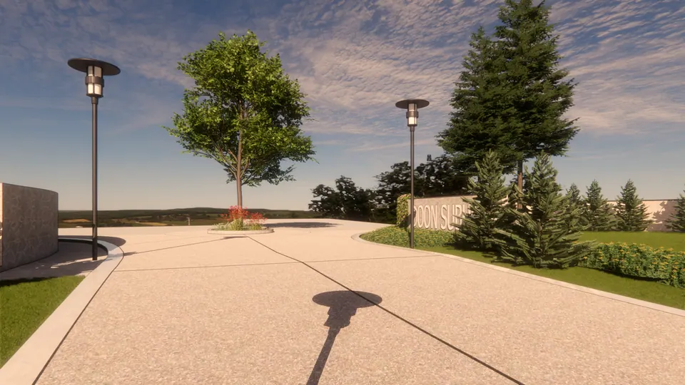 Rendered entrance plaza with lamp posts, a tree island and a stone wall bearing the development's name