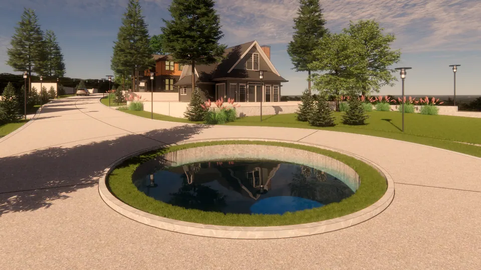 Rendered circular pond in a lawn ring at a road junction, a gabled house behind