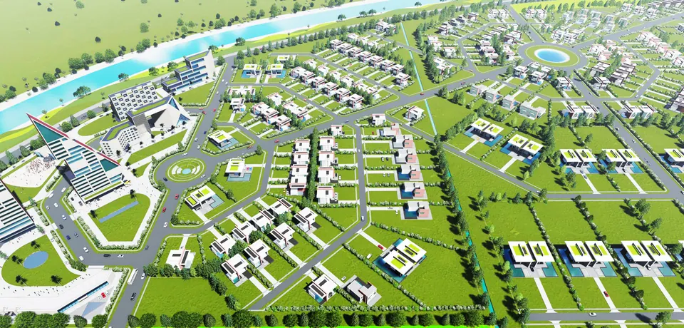 Rendered aerial of the township along a river: angular towers at the entrance, then streets of plotted houses