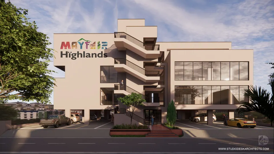Rendered club house front with stepped balconies, an external stair, large glazing and the development's logo