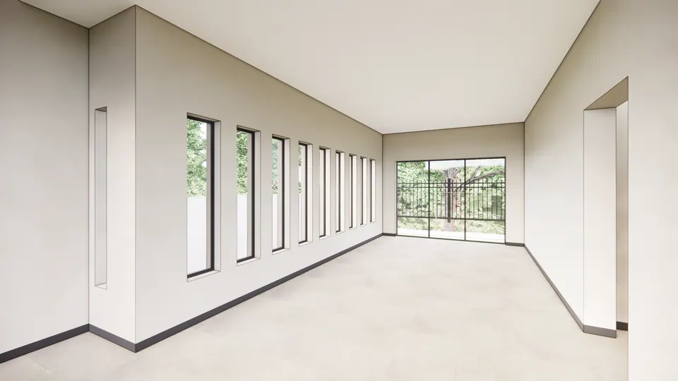 Rendered empty room lit by a row of tall slit windows, with a glazed door at the far end