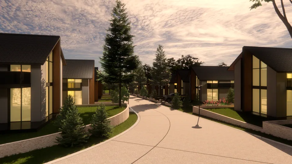 Rendered street bend with stone-faced plinths, gabled houses and a lamp post